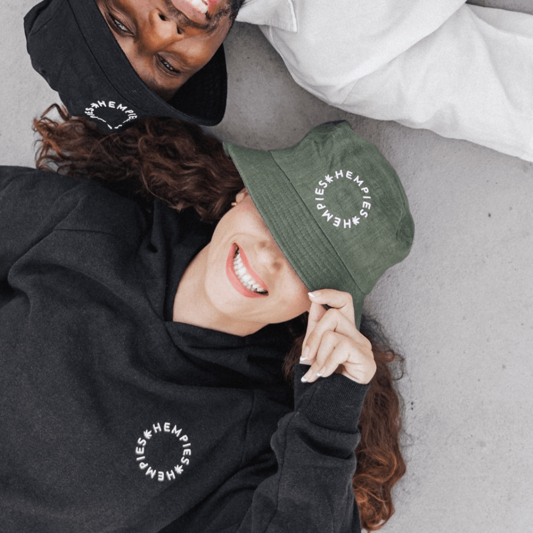 Female in Olive Green Bucket Hat and Black Hemp Organic Cotton Hoodie